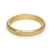 A classic men's textured wedding band in yellow gold, handmade in London by Ruth Tomlinson