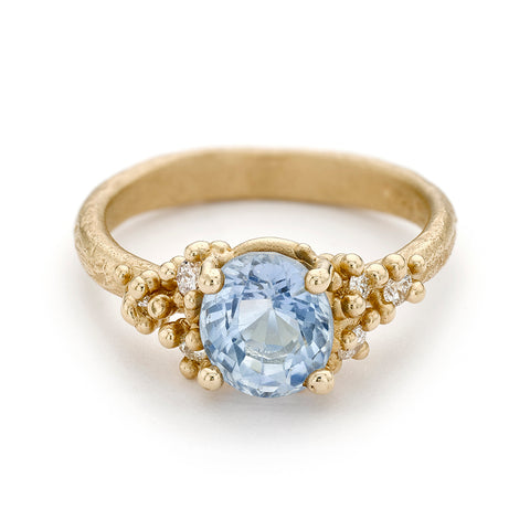 Unique blue sapphire and white diamond engagement ring from Ruth Tomlinson, made in London