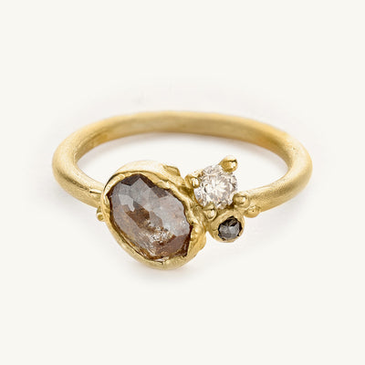 Champagne and grey diamond cluster engagement ring from Ruth Tomlinson, handmade in recycled gold