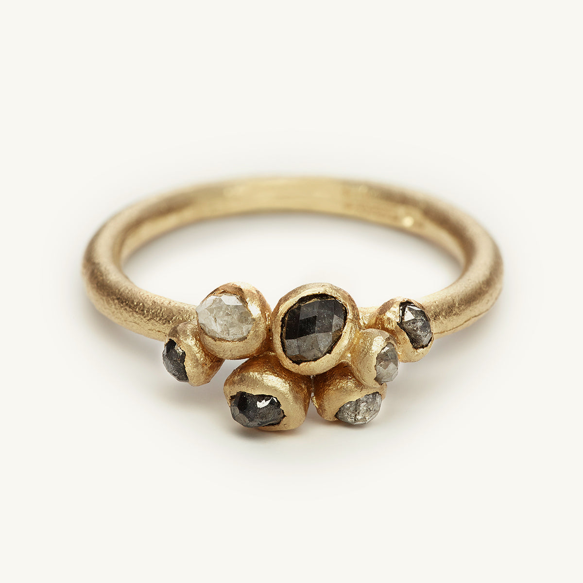 Grey diamond cluster engagement ring from Ruth Tomlinson, handmade using recycled gold