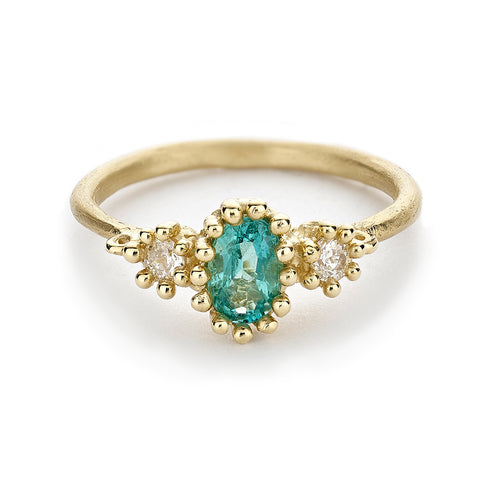 Emerald and diamond alternative engagement ring from Ruth Tomlinson, handmade in London