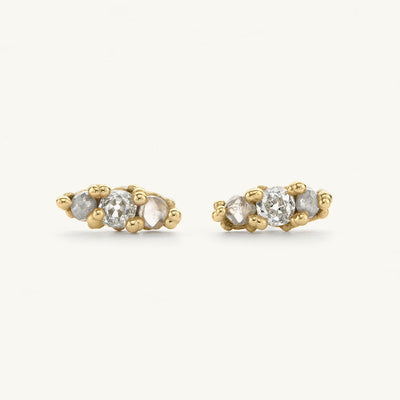 Mixed diamond studs from Ruth Tomlinson, handmade in recycled gold