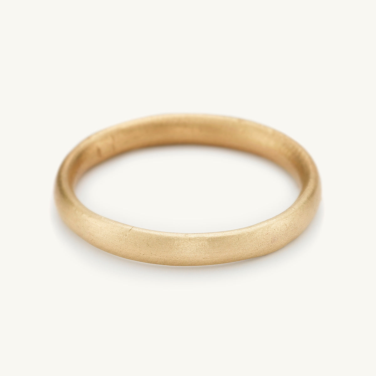 2.5mm wedding band from Ruth Tomlinson, handmade in recycled 14ct yellow gold