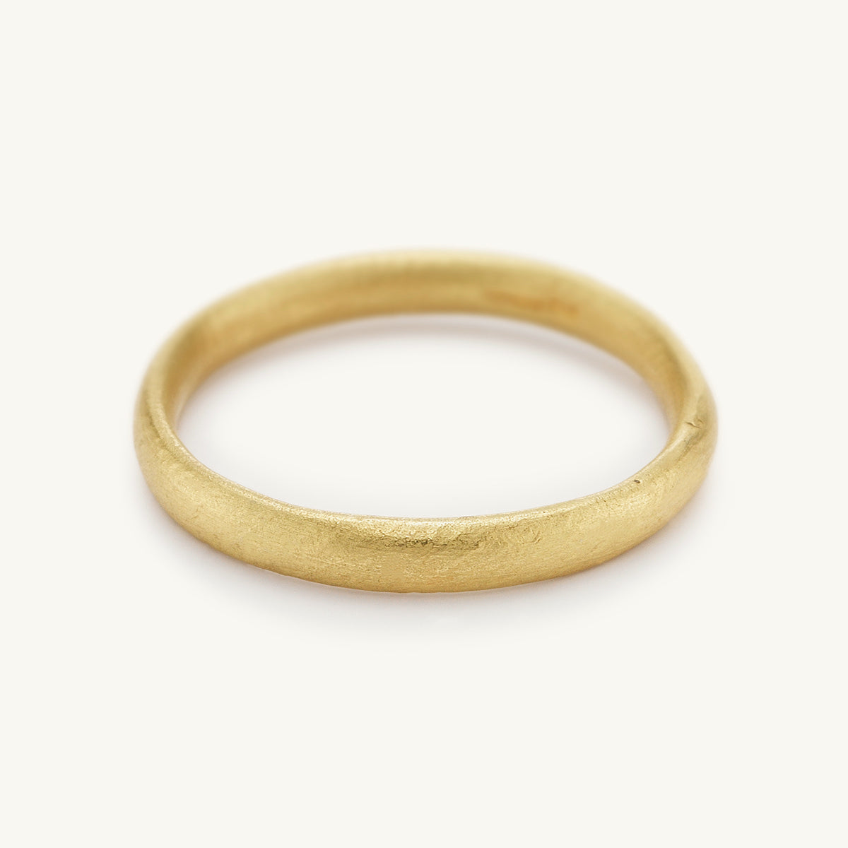 2.5mm wide wedding band from Ruth Tomlinson, handmade in recycled 18ct yellow gold