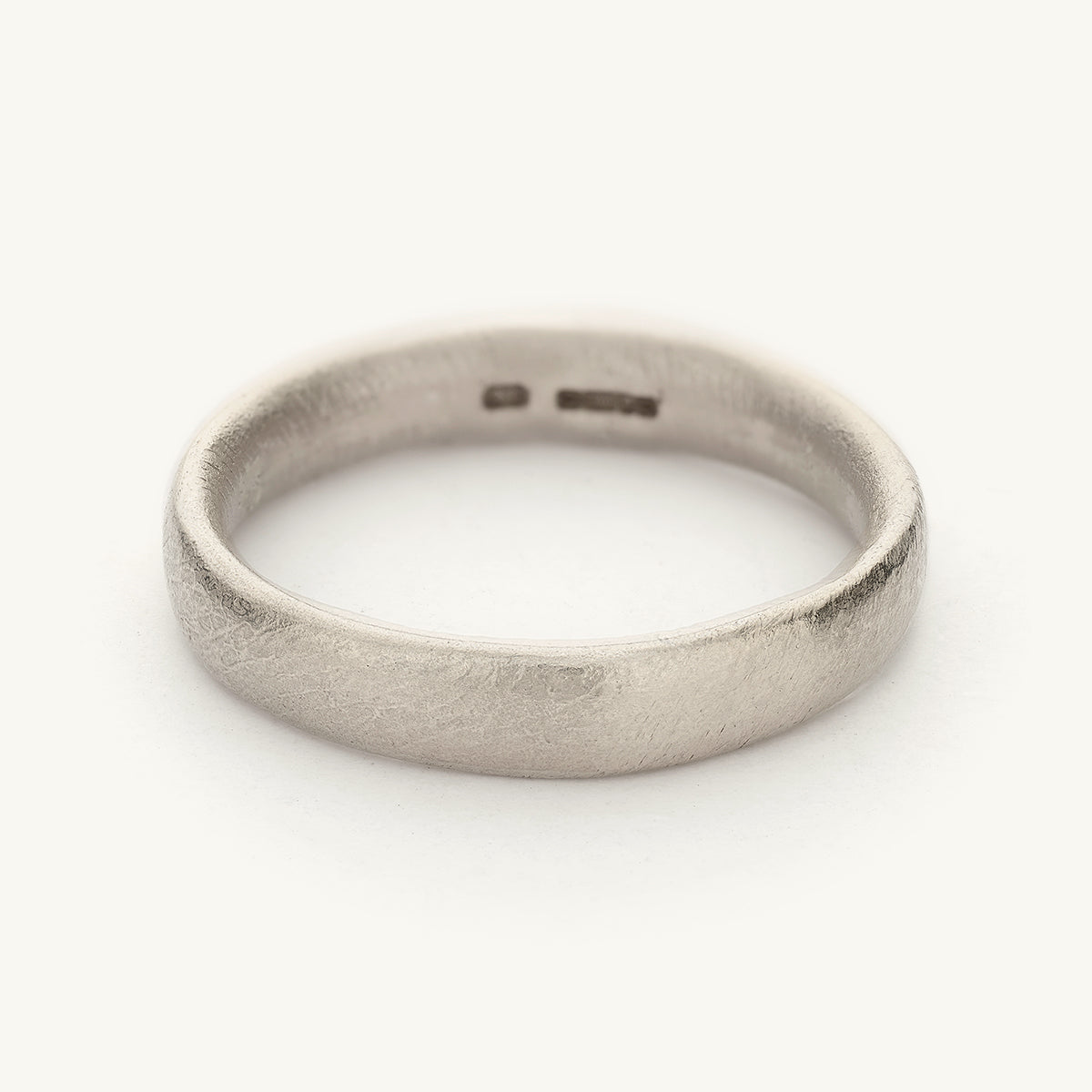 4mm mens wedding band from Ruth Tomlinson, handmade in recycled 9ct white gold