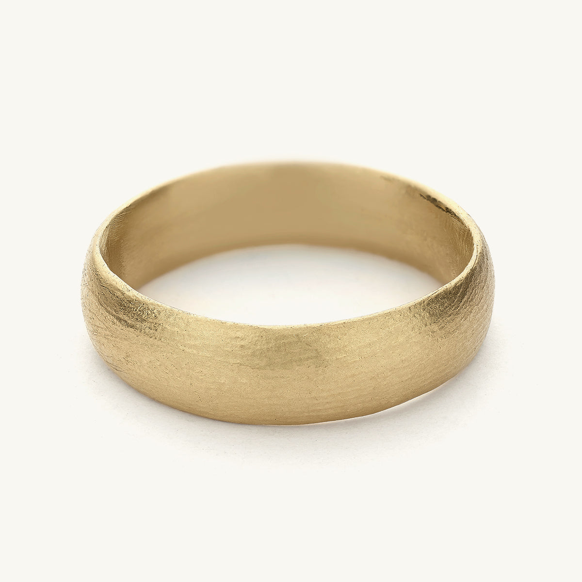 6mm wedding band from Ruth Tomlinson, handmade in recycled 14ct yellow gold