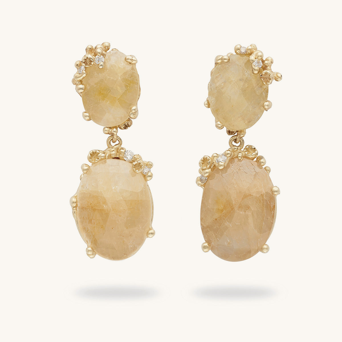 Handcrafted drop earrings by Ruth Tomlinson. Rose cut sapphires encrusted with ocean inspired details and white diamonds. 