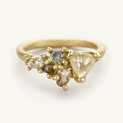 Mixed diamond tumbling cluster engagement ring from Ruth Tomlinson, made in recycled gold