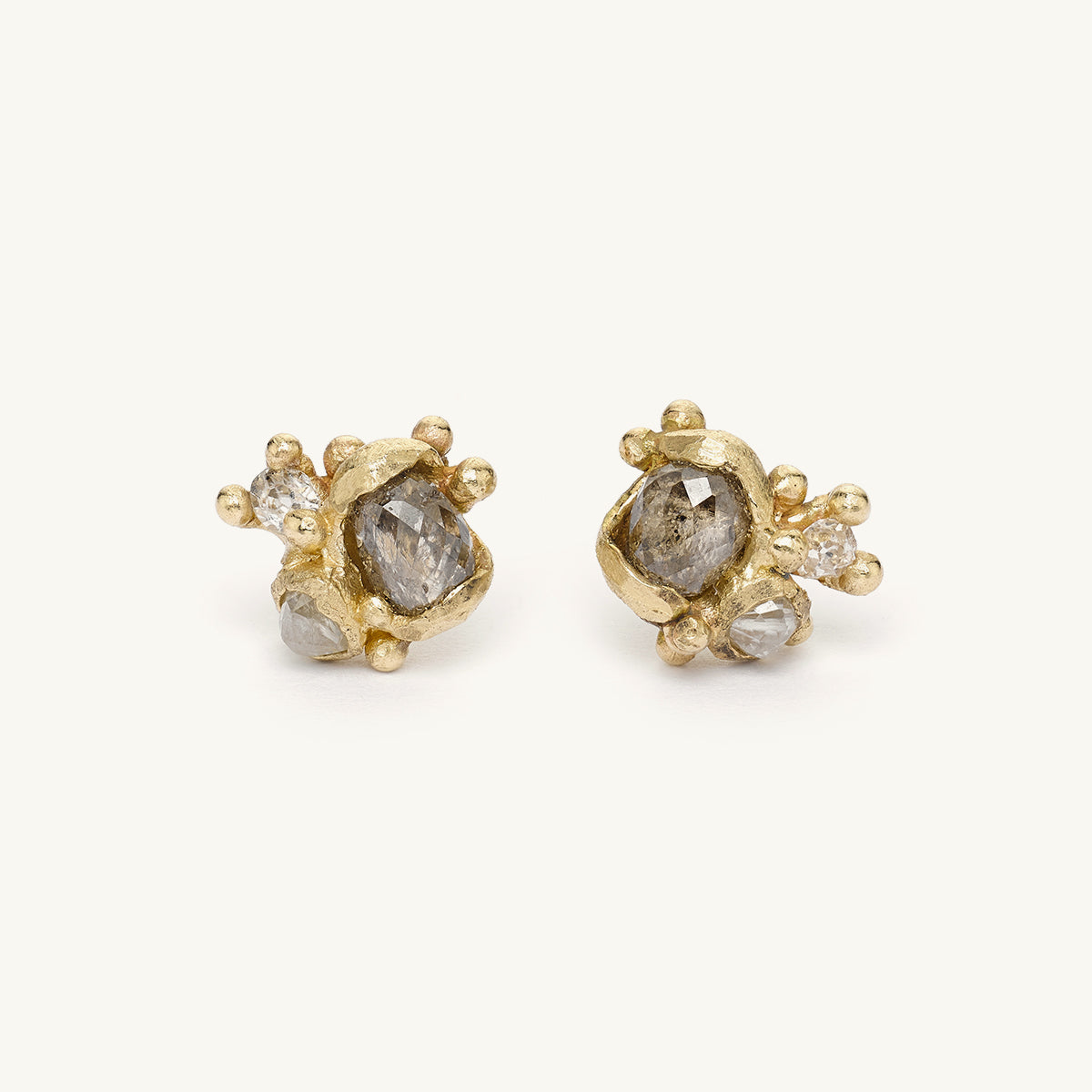 Mixed champagne diamond cluster studs from Ruth Tomlinson, handmade in recycled gold