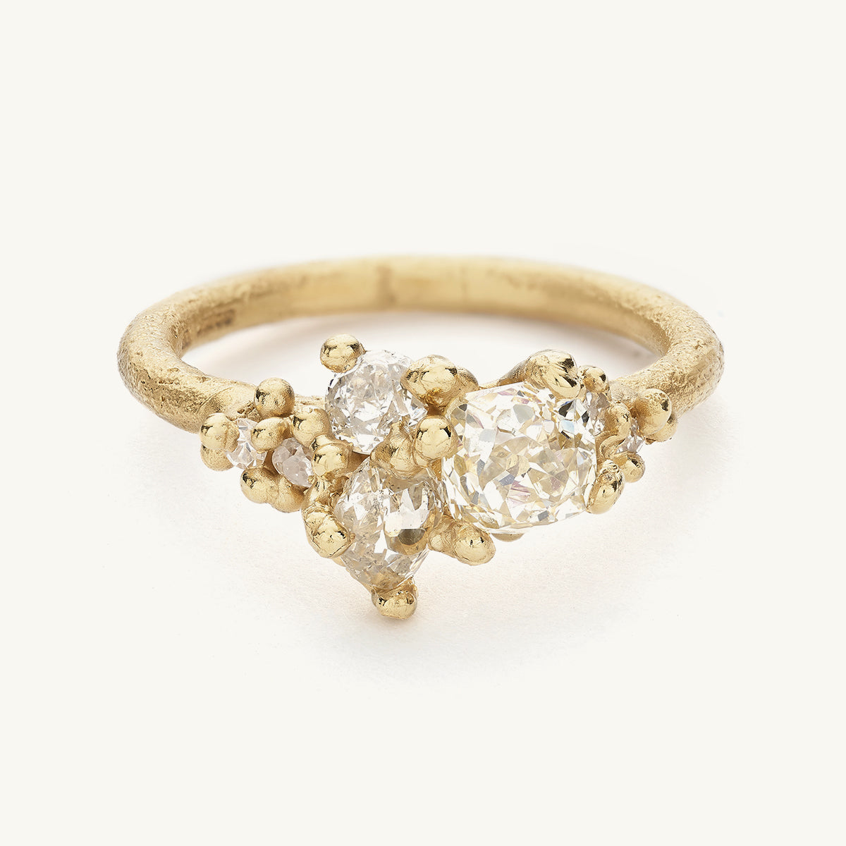 Ruth Tomlinson Antique Diamond Tapering Cluster Alternative Engagement Ring made with recycled gold