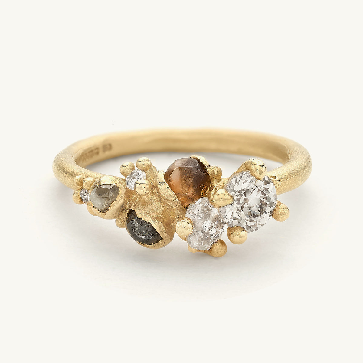 Alternative diamond cluster engagement ring from Ruth Tomlinson, handmade with recycled gold