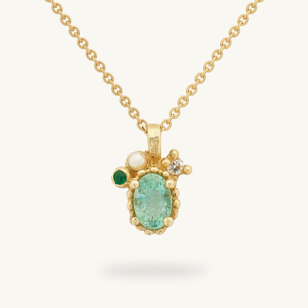 Ruth Tomlinson Decorative Emerald and Pearl Pendant made from recycled gold