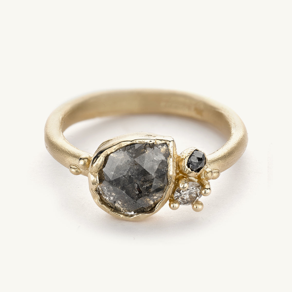 Ruth Tomlinson alternative grey diamond cluster engagement ring made with recycled gold