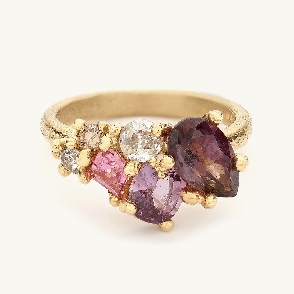 Ruth Tomlinson one of a kind alternative engagement ring with pink and purple sapphires made with recycled gold