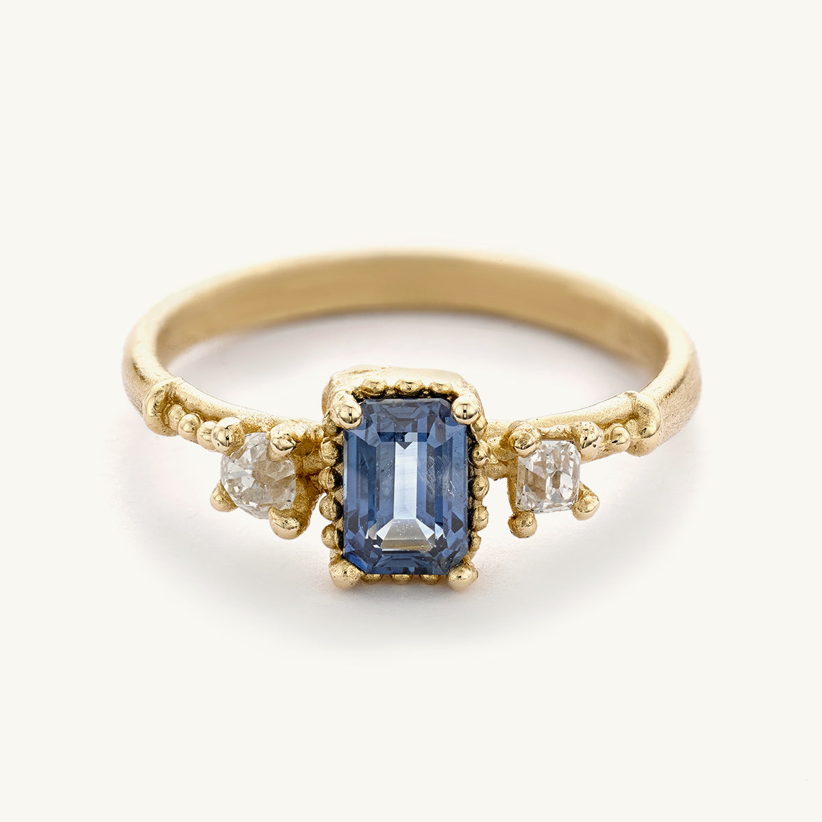 Ruth Tomlinson One of a kind sapphire engagement ring with antique diamonds made from recycled gold