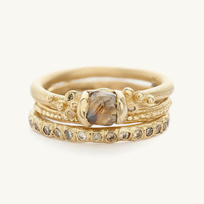 Ruth Tomlinson alternative bridal engagement ring stack with raw diamond made from recycled gold 