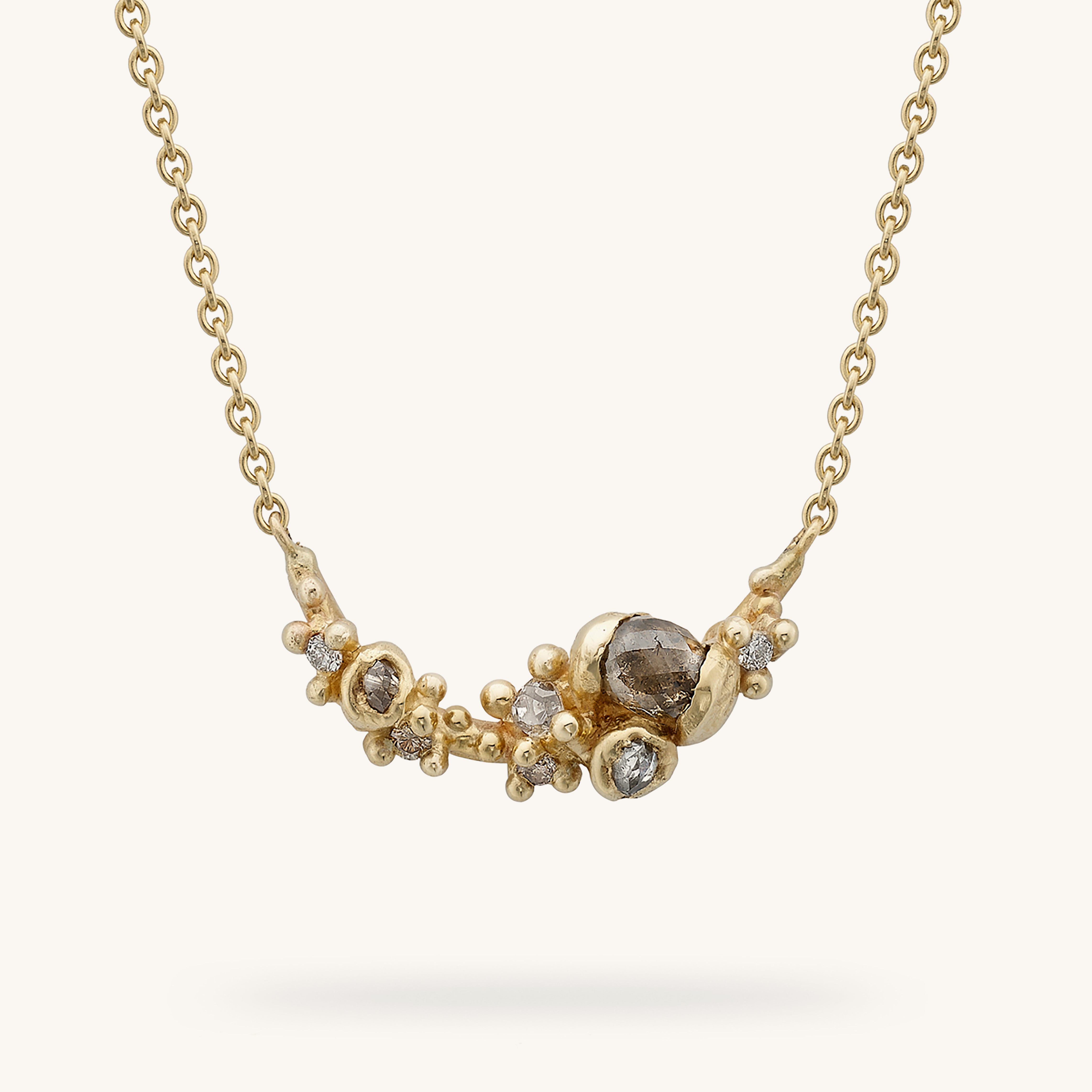 Champagne and white diamond asymmetric bar necklace from Ruth Tomlinson, handmade using recycled gold