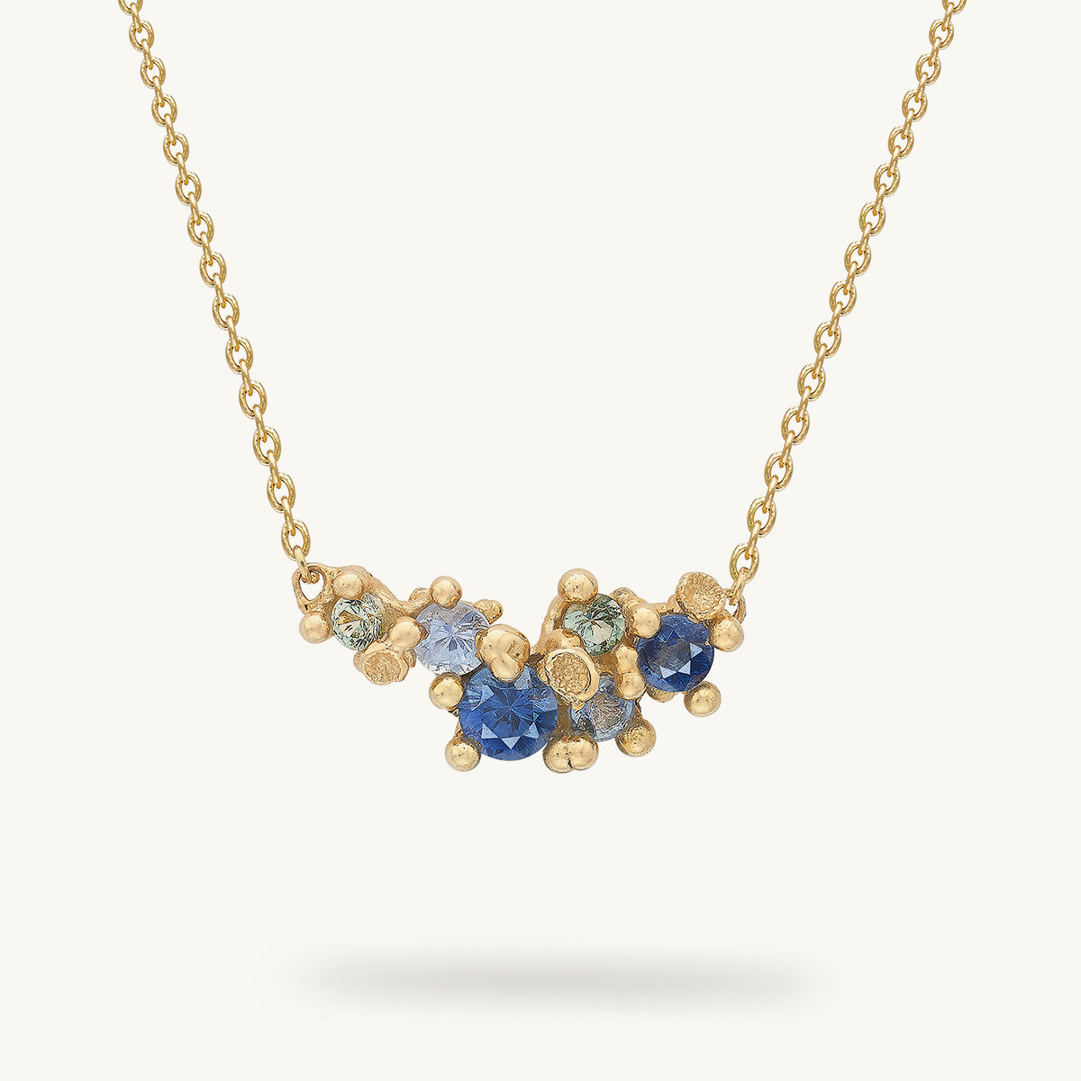 Ruth Tomlinson Ocean Inspired Sapphire Cluster necklace made from recycled gold