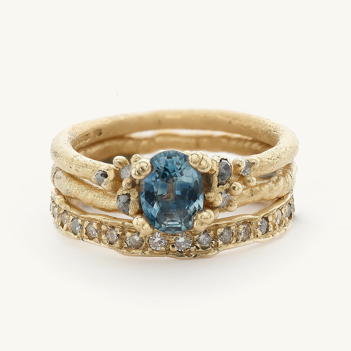 Ruth Tomlinson Alternative Sapphire and Grey Diamond Bridal Engagement Ring stack made with recycled gold 