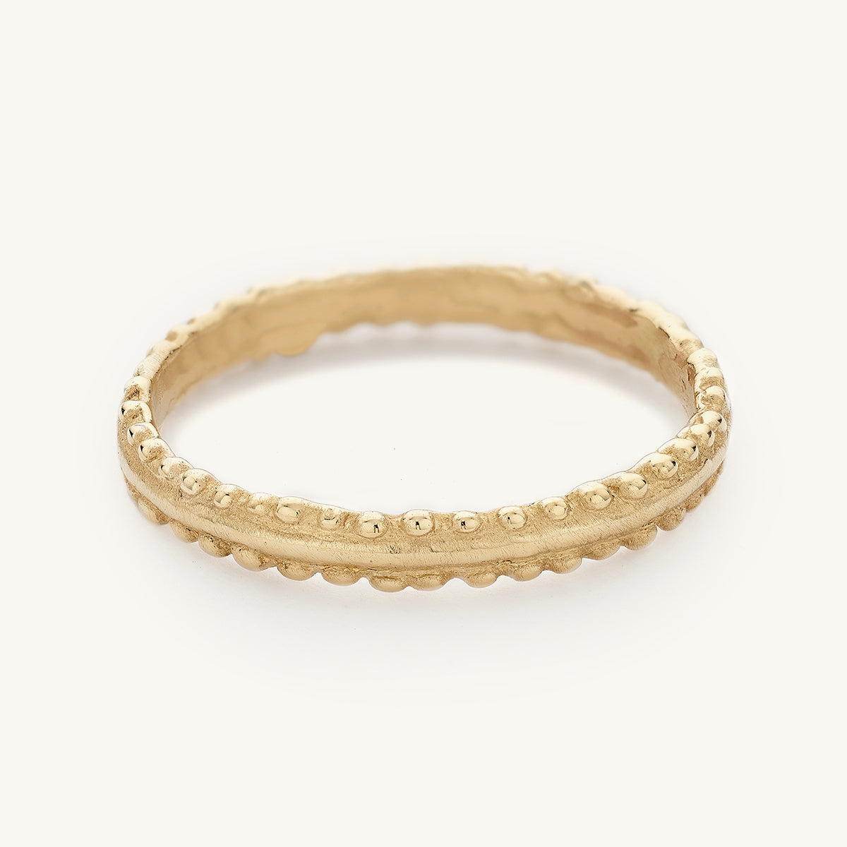 Ruth Tomlinson Alternative Wedding band with decorative details made from recycled gold