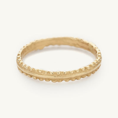 Ruth Tomlinson Alternative Wedding band with decorative details made from recycled gold