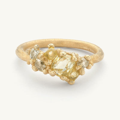 Yellow Diamond Asymmetric Tumbling Cluster Ring