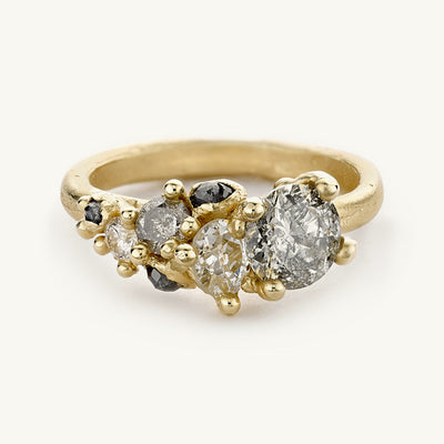 Grey diamond cluster engagement ring from Ruth Tomlinson, made with recycled gold