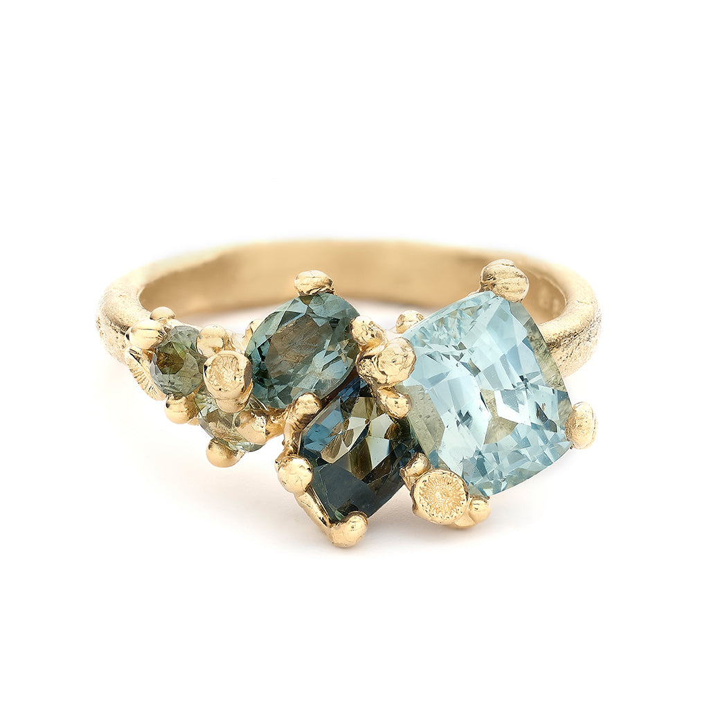 Alternative Tapering Cluster Engagement Ring with Sapphires from Ruth Tomlinson, handmade in London