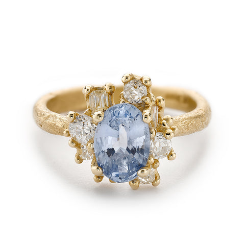 Blue sapphire and diamond cluster engagement ring from Ruth Tomlinson, handmade in London