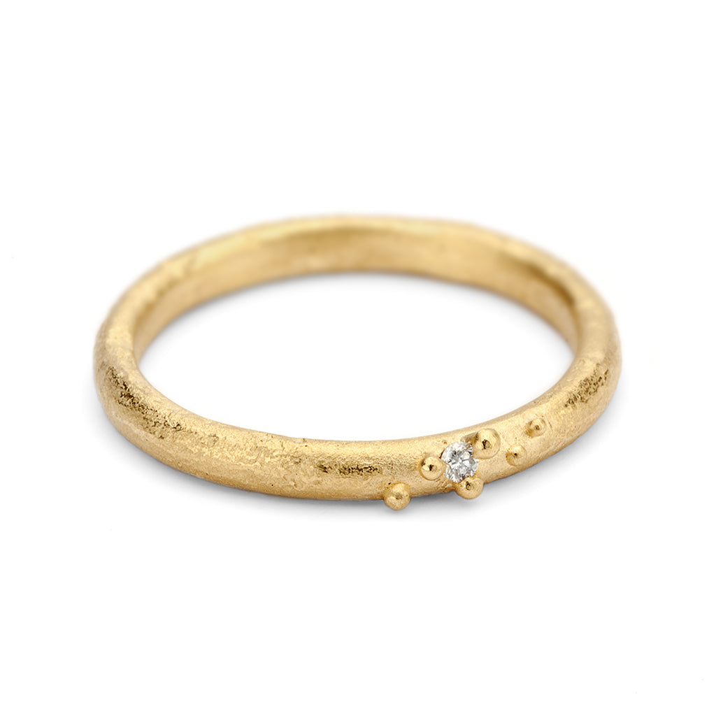 Ladies yellow gold wedding band with diamond detail from Ruth Tomlinson