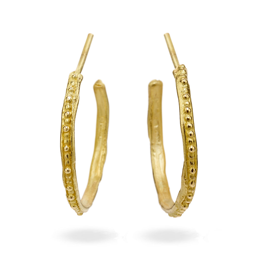 Gold hoop earrings from Ruth Tomlinson, handmade in London