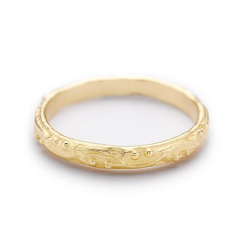 Decorative wedding band with scroll details from Ruth Tomlinson, handmade in London