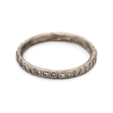 Eternity band in white gold with white diamonds by Ruth Tomlinson, handmade in London