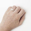 Men's 6mm white gold wedding band, on the hand